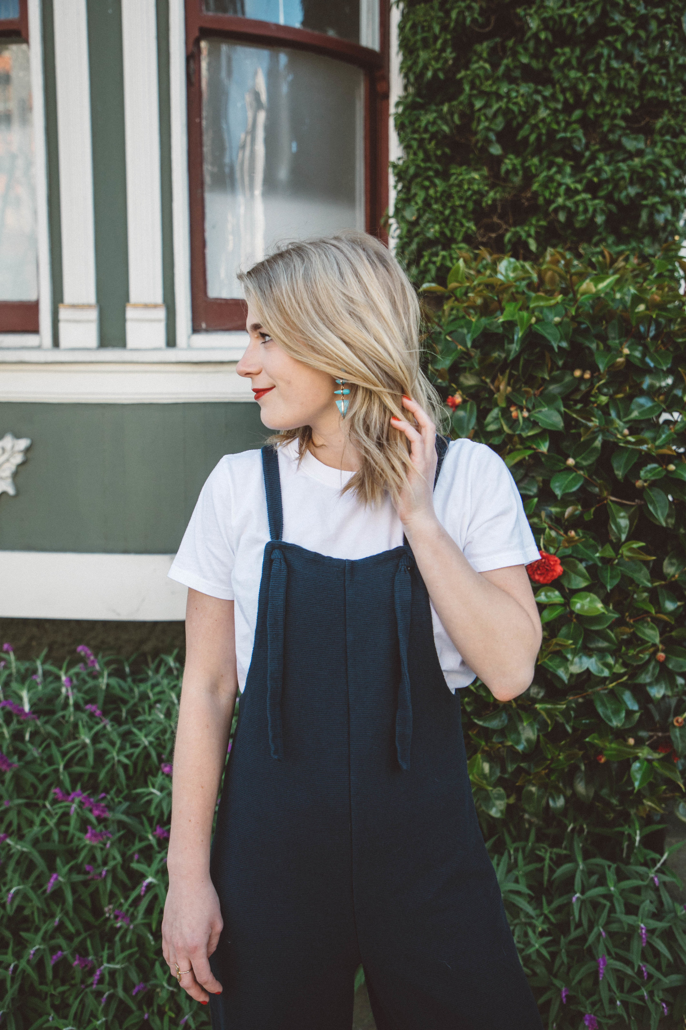 All About The Jumpsuit // A knit Madewell jumpsuit dresses up a classic Everlane white tee for an easy, everyday look.